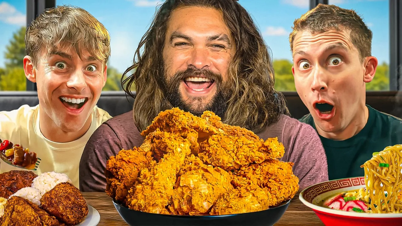 Jason Momoa with the two Jolly hosts behind a bowl of Zippy's fried chicken, a plate lunch and a bowl of saimin