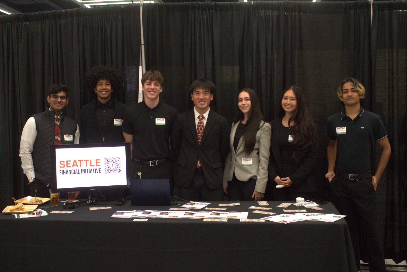 The SUCUI team at an event booth